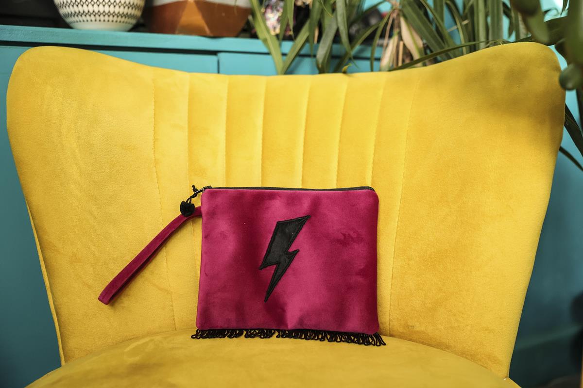 Luscious Velvet Clutch Bag With Black Lightning Bolt and fringed hem