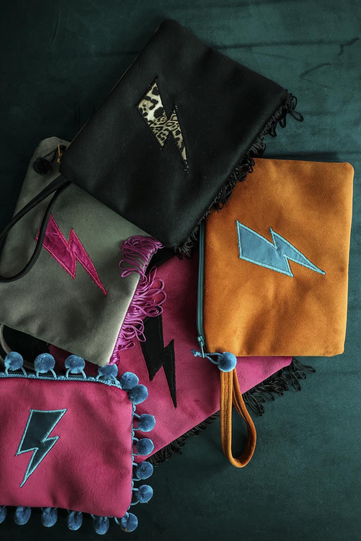 Luscious Velvet Clutch Bag With Black Lightning Bolt and fringed hem