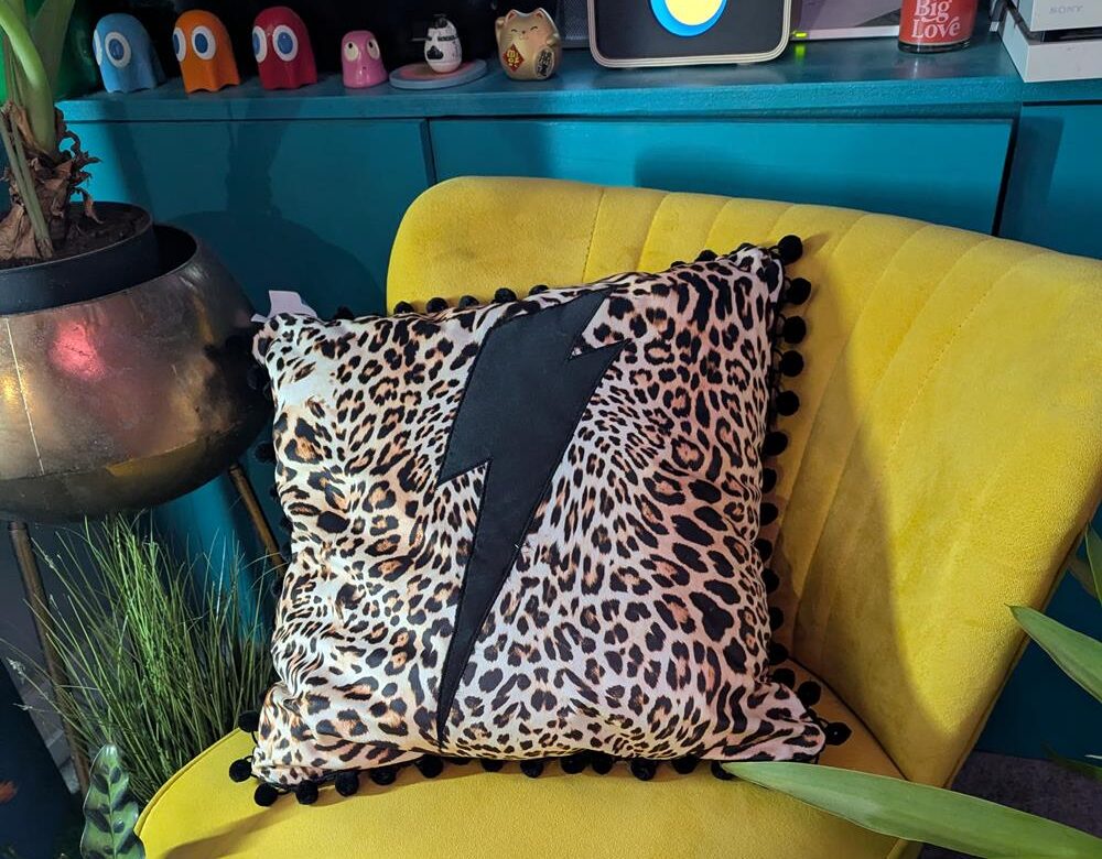 Rock Lightning Bolt on Cheetah leopard Velvet cushion with Black Trim - Ready to Go!!!